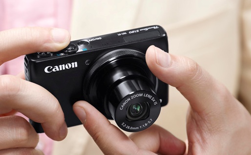 Фотоаппарат в руках